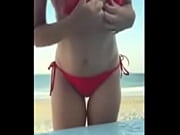 at the beach and mischievous
