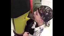 Sucking and taking the 's piss in the bathroom