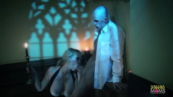 A pale vampire pounds the blonde milf with big tits on the staircase before giving her a facial