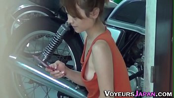 Asian teen filmed outside