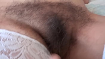 He puts his finger in the ass while masturbating a beautiful stepmother