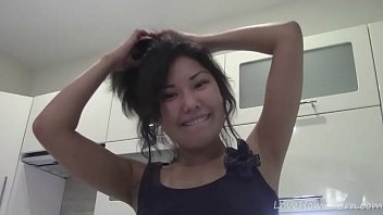 Cute Asian gets completely naked in the bathroom