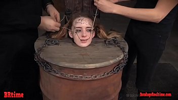 Bdsm babe in a barrel and electrified