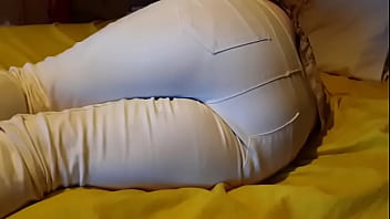 Bed wetting in pee stained white jeans