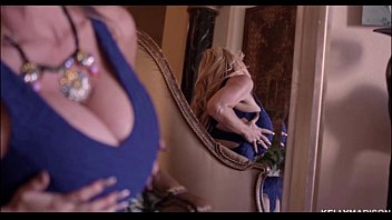 Sexy MILF Kelly Madison Shakes Her Huge Boobs In A Blue Dress