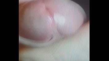 A close up jerk with cum shot watched by girlfriend.