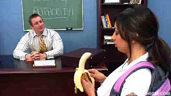 sexy brunette girl seduces her teacher by eating banana before getting fucked