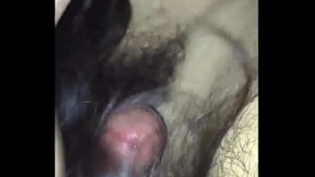 Brunette blowing a hairy cock to orgasm