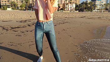 wet shoot on a public beach with crazy model risky outdoor masturbation foot fetish pee in jeans wet sneakers