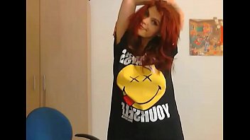 redhaired redhead in t shirt strips off to nothing