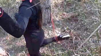 Tied to a tree on a sexy outfit, masked and outdoor deepthroat with no mercy