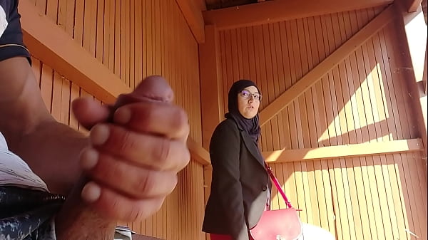 young boy shocks this muslim girl who was waiting for her bus with his big cock, OMG !!! someone surprised them; he might have problems and run away