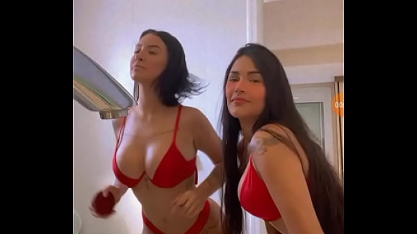 Bianca and Flay dancing in a bikini